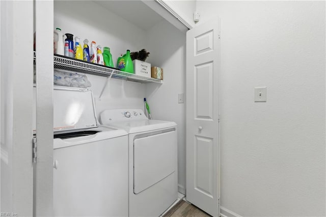 8550 Tidewater Dr Unit I2, Norfolk, VA 23503 - laundry area featuring laundry area, wood finished floors, and washing machine and clothes dryer