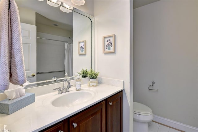 bathroom with tile patterned flooring, vanity, toilet, baseboards, and a shower with curtain