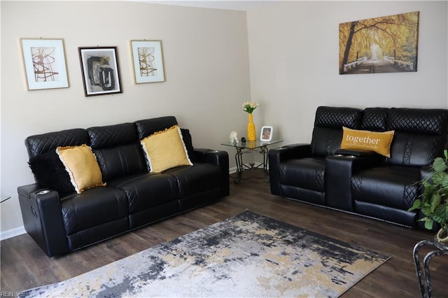 living area featuring wood finished floors and baseboards