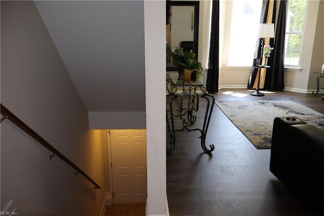 interior space featuring wood finished floors and baseboards
