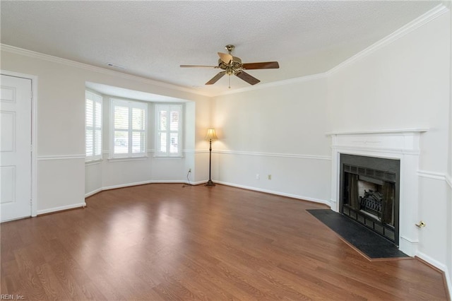 117 Gnarled Oak Ln, Yorktown, VA 23692 - unfurnished living room featuring ceiling fan, a fireplace with flush hearth, crown molding, wood finished floors, and baseboards