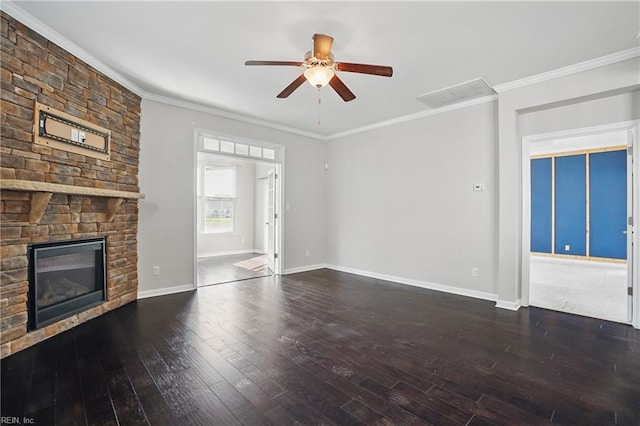 unfurnished living room featuring a large fireplace, ceiling fan, ornamental molding, and hardwood / wood-style flooring