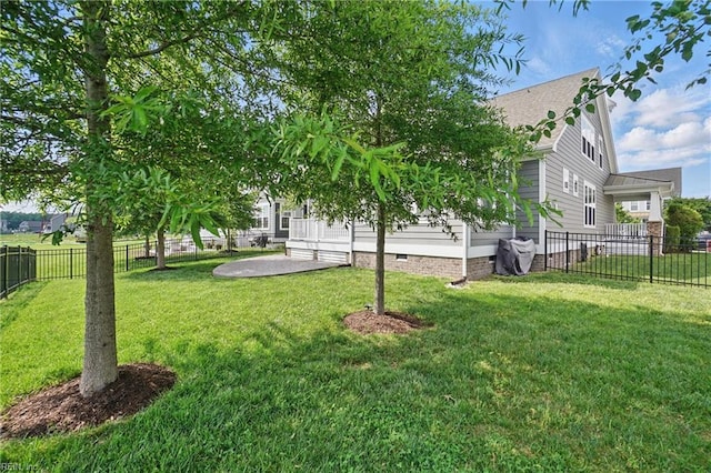 view of yard with a fenced backyard