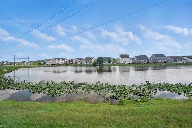 view of water feature with a residential view