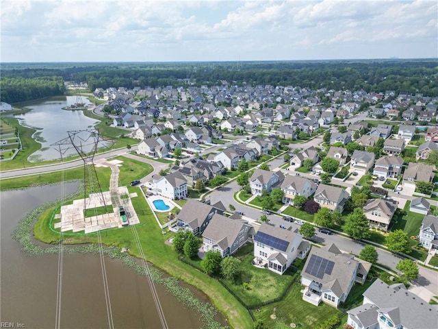 bird's eye view with a residential view and a water view