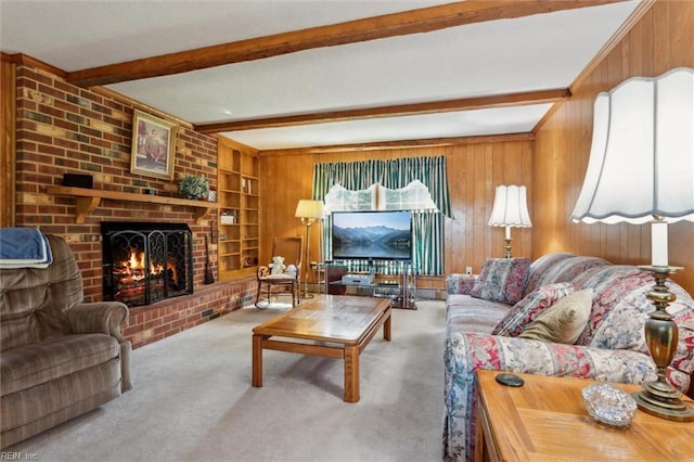 living room featuring carpet floors, wood walls, built in features, a fireplace, and beamed ceiling