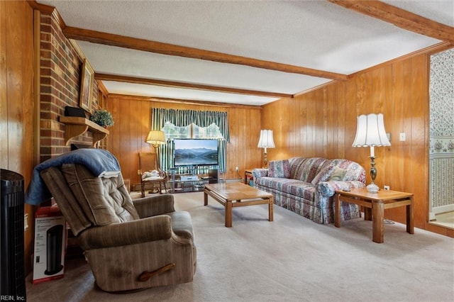 carpeted living area with wooden walls, beam ceiling, and a fireplace