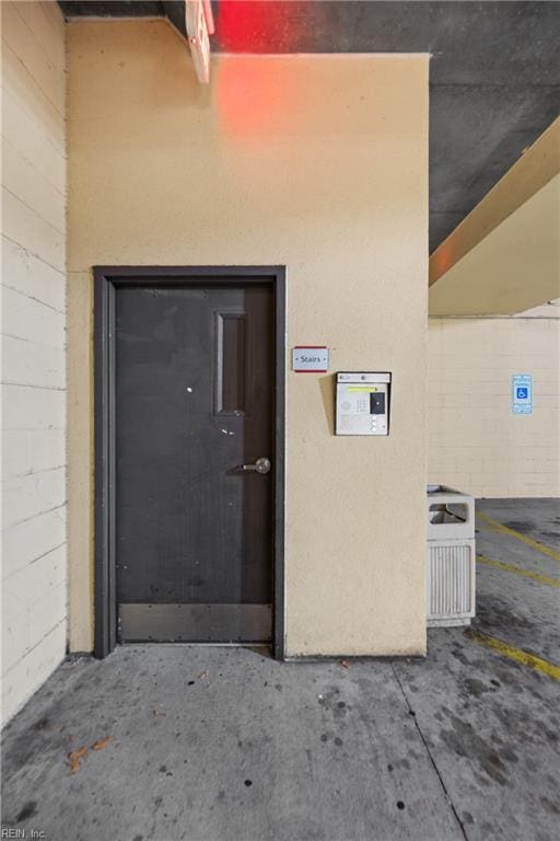 1400 Granby St Unit 117, Norfolk, VA 23510 - view of exterior entry with stucco siding