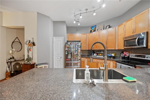 1400 Granby St Unit 117, Norfolk, VA 23510 - kitchen featuring stainless steel appliances, dark countertops, a sink, and light brown cabinets