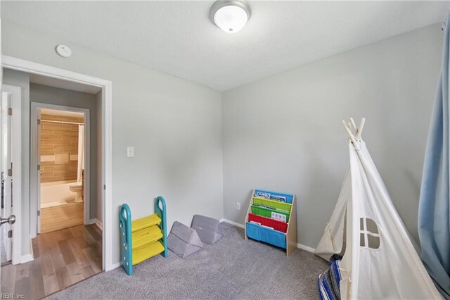game room with baseboards