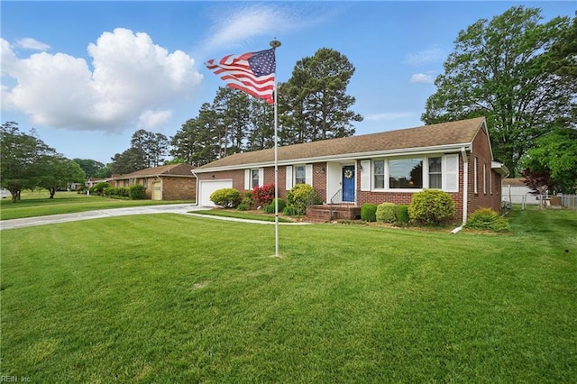 ranch-style house featuring concrete driveway, brick siding, a front yard, and a garage