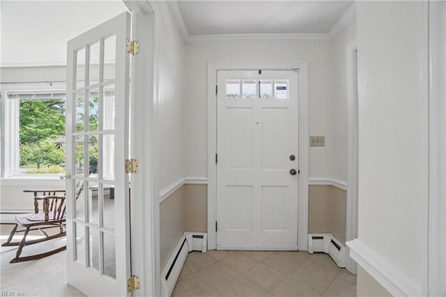 doorway to outside with crown molding, a baseboard radiator, and light tile patterned floors