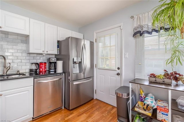 1628 Red Brook Ct, Norfolk, VA 23518 - kitchen featuring stainless steel appliances, a sink, dark countertops, and healthy amount of natural light