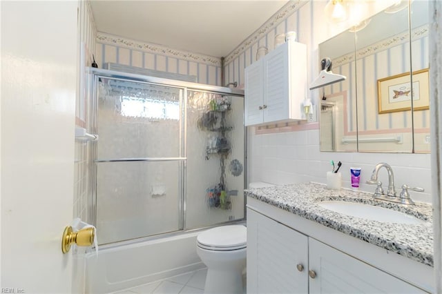 1628 Red Brook Ct, Norfolk, VA 23518 - full bath with toilet, vanity, shower / bath combination with glass door, tile patterned flooring, and backsplash