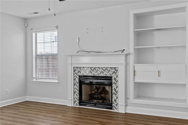 159 Stoney Ridge Ave, Suffolk, VA 23435 - unfurnished living room featuring a tiled fireplace, a ceiling fan, baseboards, wood finished floors, and visible vents