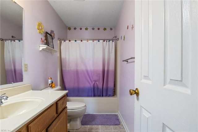full bathroom featuring vanity, a textured ceiling, shower / bath combo, and toilet