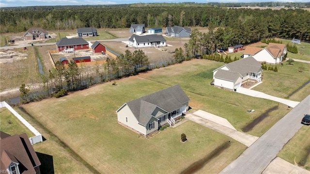 bird's eye view featuring a view of trees