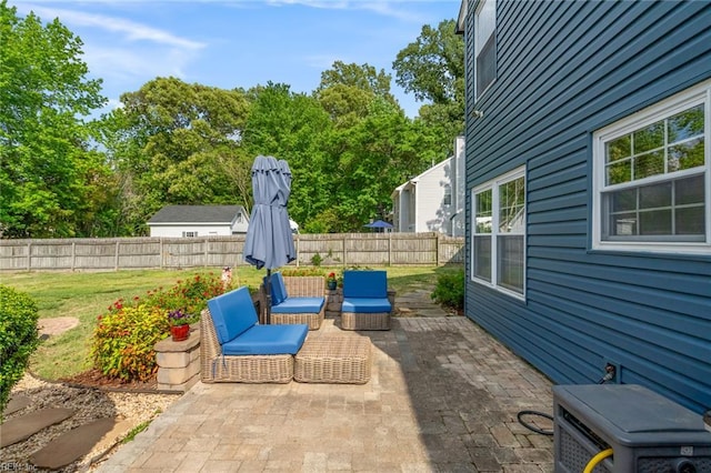 view of patio / terrace with a fenced backyard and an outdoor hangout area