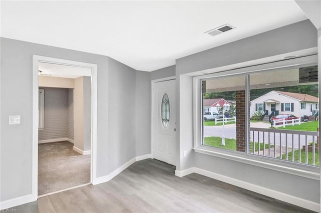 913 Garfield Ave, Suffolk, VA 23434 - foyer with baseboards, visible vents, and wood finished floors