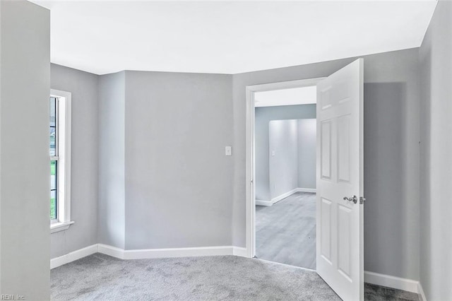 913 Garfield Ave, Suffolk, VA 23434 - carpeted spare room with baseboards
