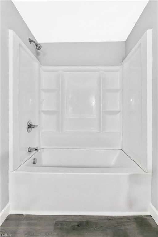 913 Garfield Ave, Suffolk, VA 23434 - full bath with baseboards and washtub / shower combination
