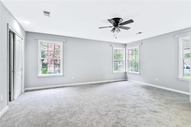 913 Garfield Ave, Suffolk, VA 23434 - unfurnished room with carpet floors, baseboards, and visible vents