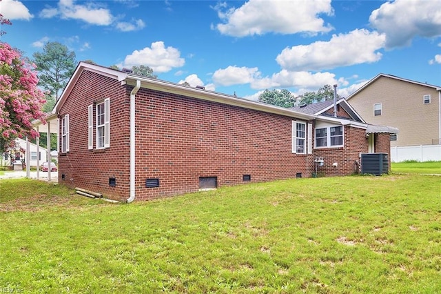 913 Garfield Ave, Suffolk, VA 23434 - view of side of property featuring brick siding, a yard, crawl space, and cooling unit