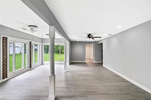 913 Garfield Ave, Suffolk, VA 23434 - unfurnished living room featuring ceiling fan, baseboards, and wood finished floors
