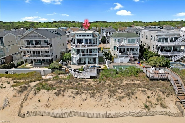 birds eye view of property with a residential view