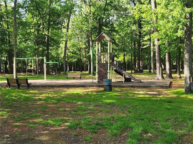 view of community featuring a yard and playground community