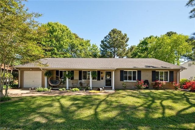ranch-style house featuring brick siding, a garage, a porch, a front yard, and driveway