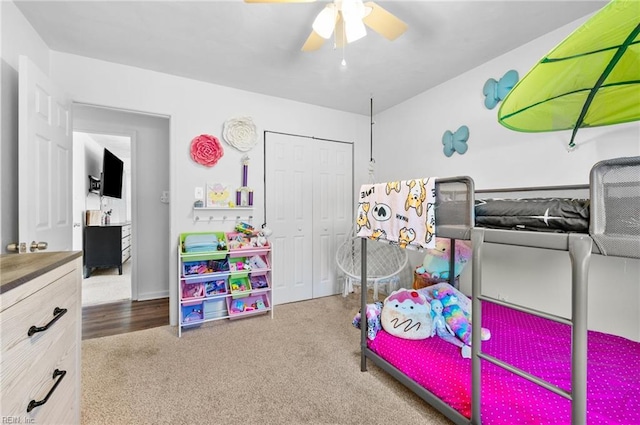 bedroom featuring a closet, a ceiling fan, and carpet flooring