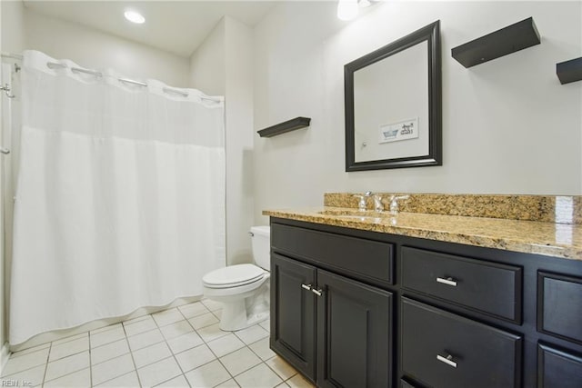 full bathroom featuring vanity, tile patterned floors, toilet, and curtained shower