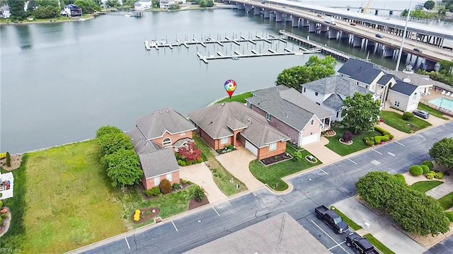 aerial view featuring a water view and a residential view