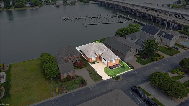 bird's eye view with a water view