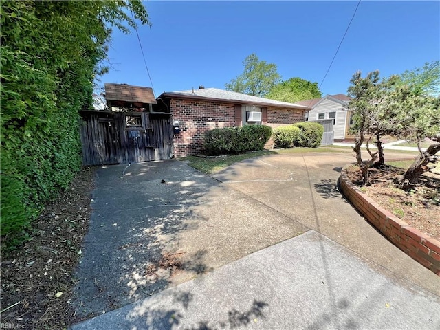 view of front of property featuring brick siding