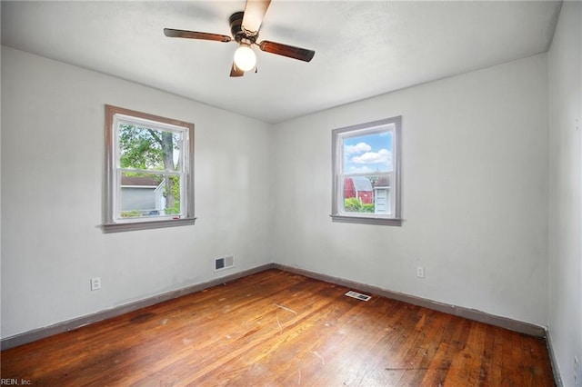 1 Polaris St, Hampton, VA 23669 - empty room with visible vents, a ceiling fan, baseboards, and light wood-style floors