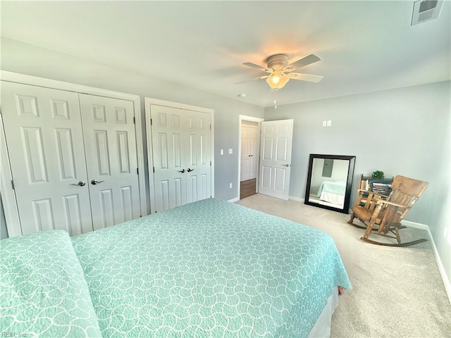 107 Mill Creek Rd, Edenton, NC 27932 - bedroom featuring baseboards, carpet floors, multiple closets, and a ceiling fan