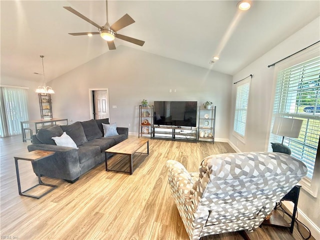 107 Mill Creek Rd, Edenton, NC 27932 - living area featuring vaulted ceiling, wood finished floors, a chandelier, baseboards, and a ceiling fan