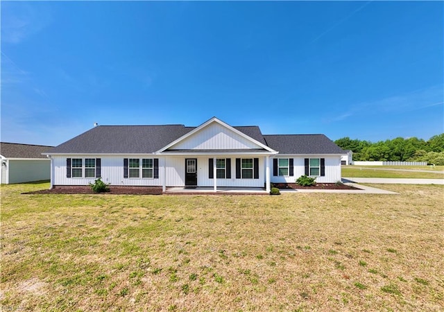 107 Mill Creek Rd, Edenton, NC 27932 - modern farmhouse style home with a front lawn and covered porch