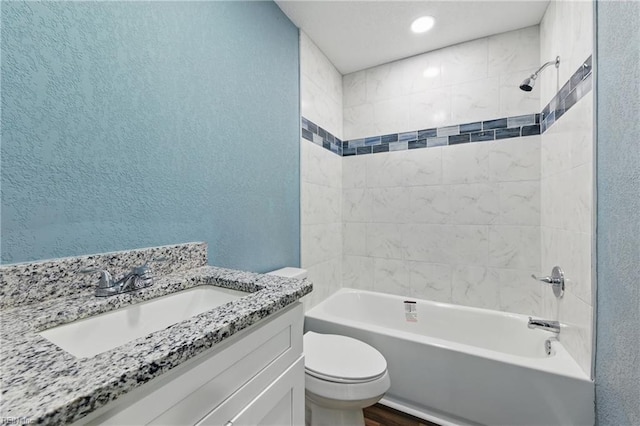725 Burgesses Ln, Virginia Beach, VA 23452 - bathroom with shower / tub combination, wood finished floors, vanity, toilet, and a textured wall