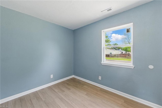 725 Burgesses Ln, Virginia Beach, VA 23452 - empty room featuring visible vents, baseboards, and wood finished floors