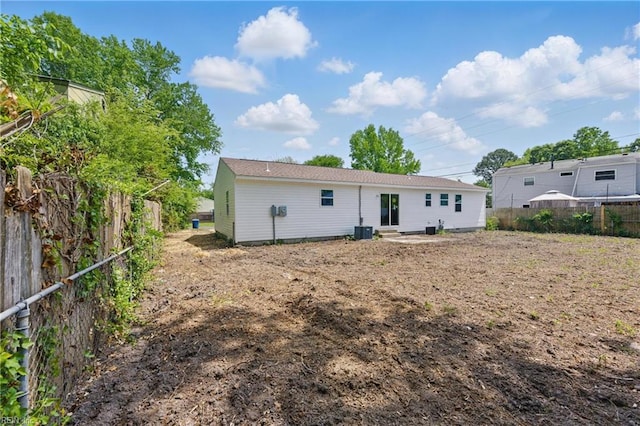 725 Burgesses Ln, Virginia Beach, VA 23452 - rear view of property with central AC unit and a fenced backyard