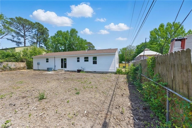 725 Burgesses Ln, Virginia Beach, VA 23452 - back of property featuring a fenced backyard, cooling unit, entry steps, and crawl space