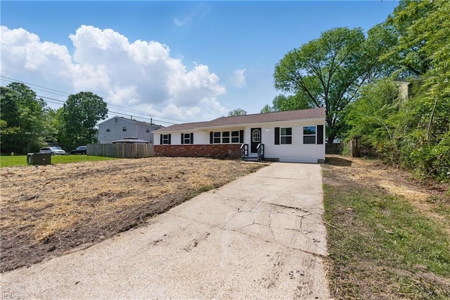 725 Burgesses Ln, Virginia Beach, VA 23452 - ranch-style home with fence, driveway, and brick siding