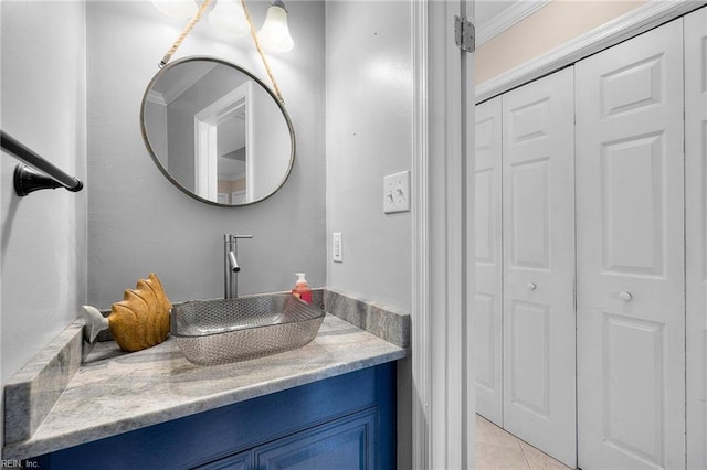 1101 Revelstroke Ct, Virginia Beach, VA 23454 - bathroom featuring vanity, tile patterned floors, a closet, and ornamental molding