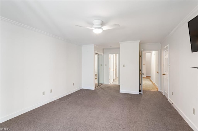 200 Moodys Run, Williamsburg, VA 23185 - unfurnished bedroom featuring dark carpet, crown molding, baseboards, and ceiling fan