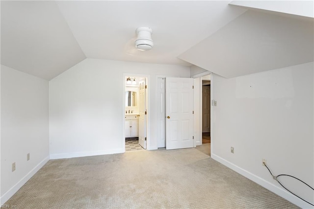 200 Moodys Run, Williamsburg, VA 23185 - additional living space with light colored carpet, baseboards, and vaulted ceiling