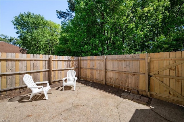 view of patio with a fenced backyard