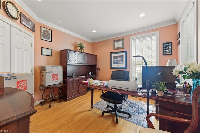 home office with light wood-style floors, baseboards, ornamental molding, and recessed lighting